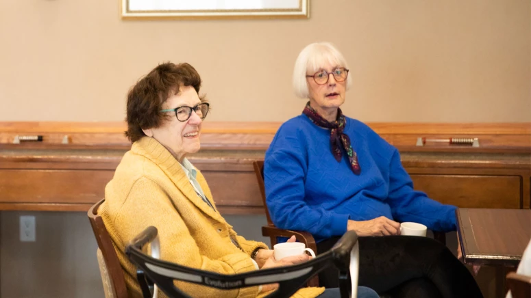 Two seniors sitting together